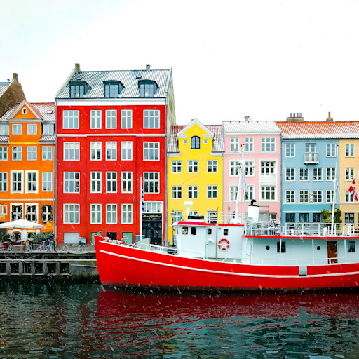 Re-use excess energy from operations to heat buildings